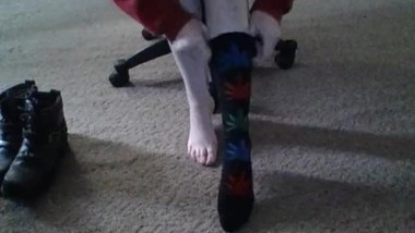 Becky putting on weed socks and Harley boots