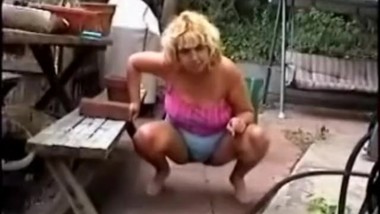 Monica pissing outside