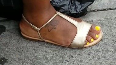 Candid ebony feet yellow toes