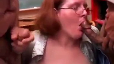 Horny Teacher sucks 2 cocks